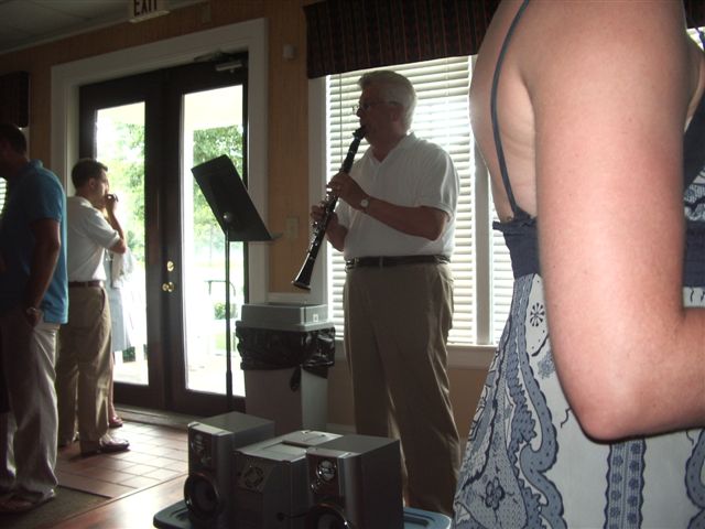 Carl playing at rehearsal dinner